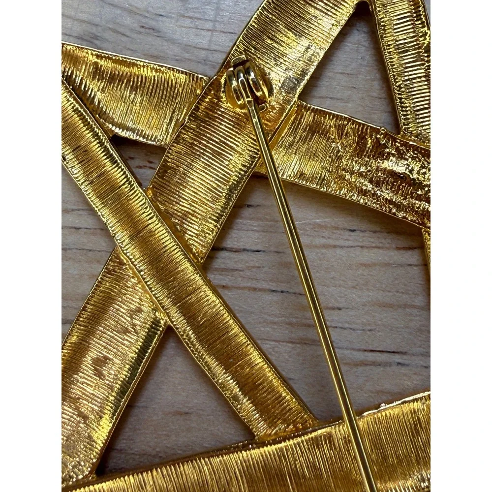 Yves Saint Laurent type brooch
